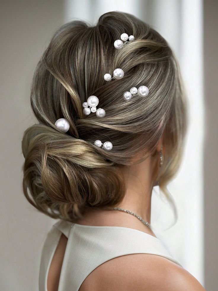 Chignon tresse avec perles pour mariee